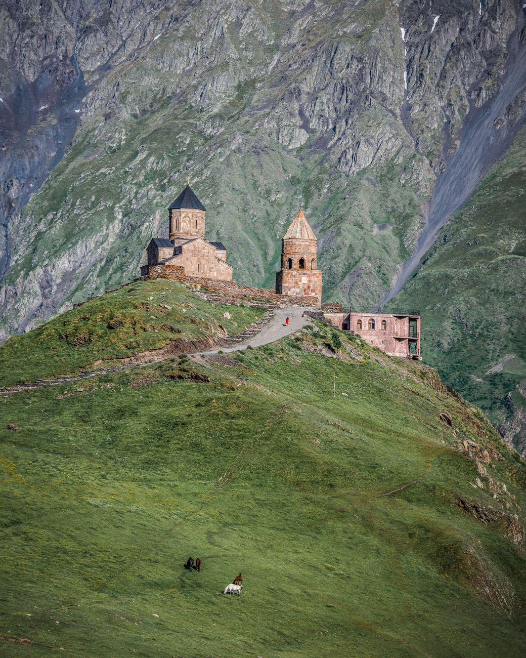 Gergeti Trinity Church beneath the Caucasus mountains in Georgia